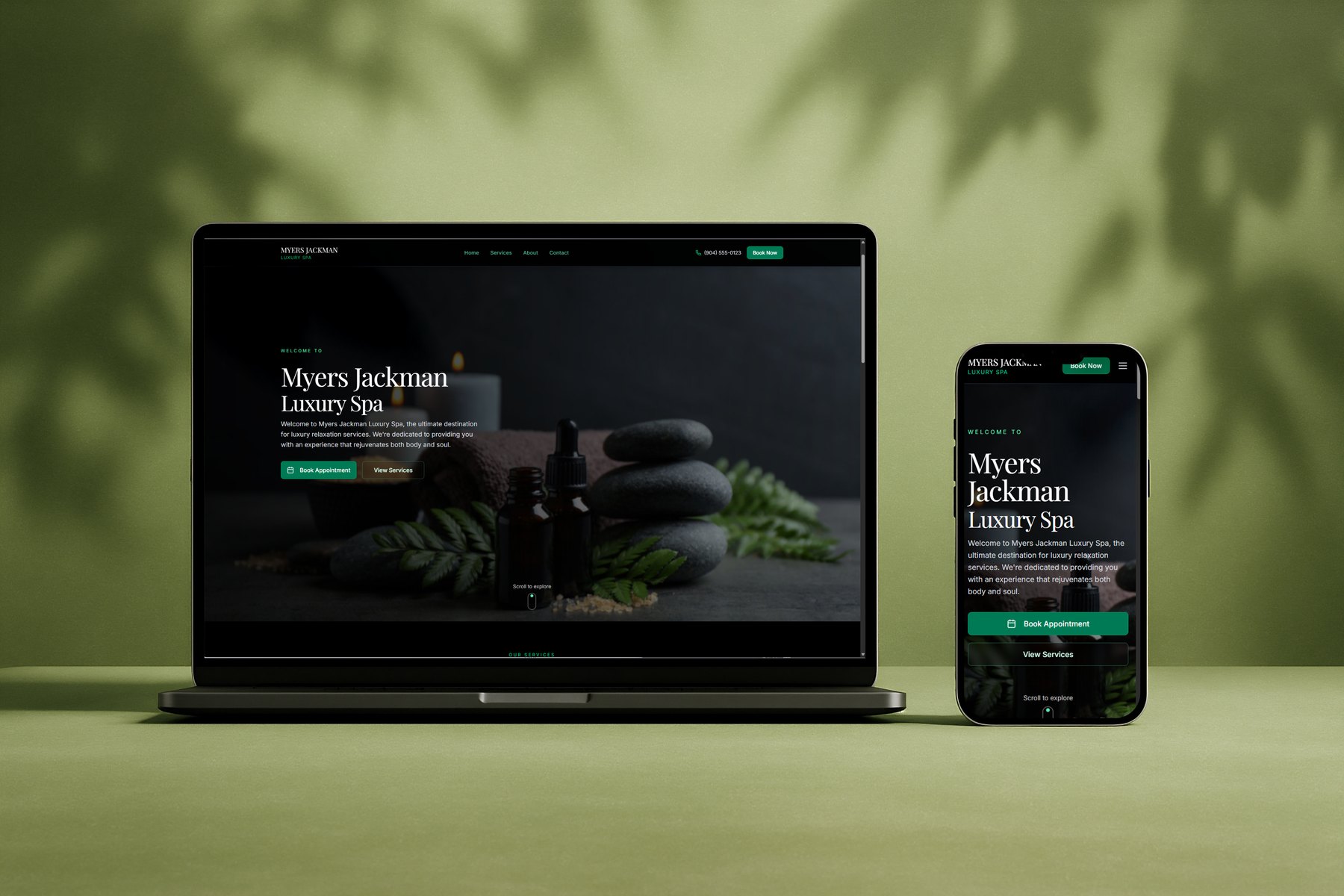 Myers Jackman Luxury Spa homepage shown on laptop and mobile, dark hero with candles and spa stones