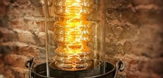 Steampunk Edison-bulb lantern product photo, representing the Timeless Island Visions case study